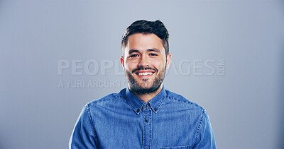 Buy stock photo Portrait, smile and space with designer man in studio for artistic, creative or freelance profession. Career, internship and publisher with happy entrepreneur on gray background mockup for journalism