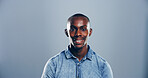 Smile, confidence and portrait of black man in studio with mockup space, creative or university registration. Opportunity, id card or gen z student in college candidate recruitment on gray background
