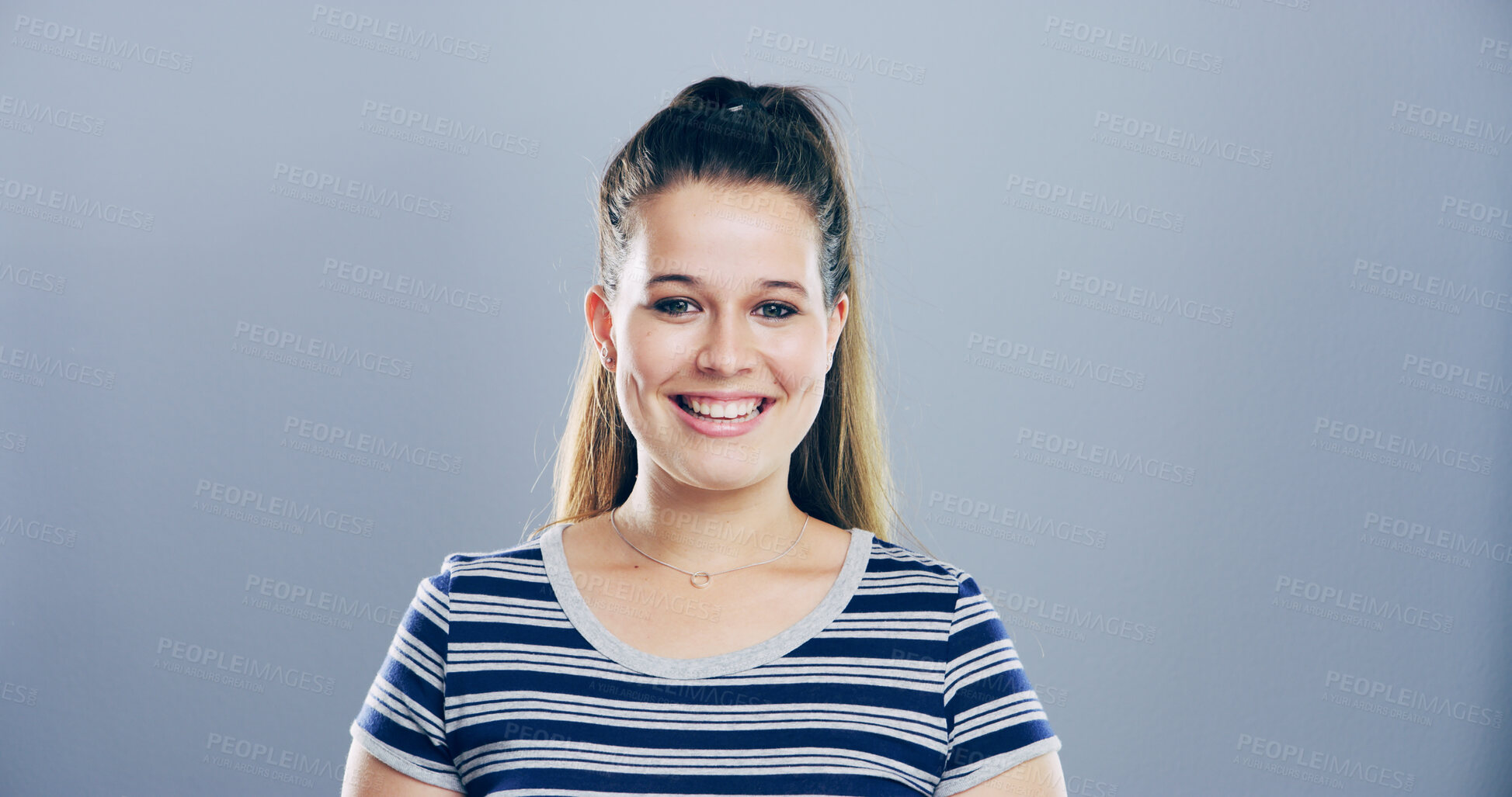 Buy stock photo Happy, creative and portrait of woman in studio with mockup space, confidence or university registration. Opportunity, identity card or gen z girl in college candidate recruitment on gray background