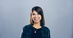 Portrait, smile and creative business woman, writer and magazine editor isolated on gray studio background. Face, space and confident person, professional and worker with opportunity in Portugal