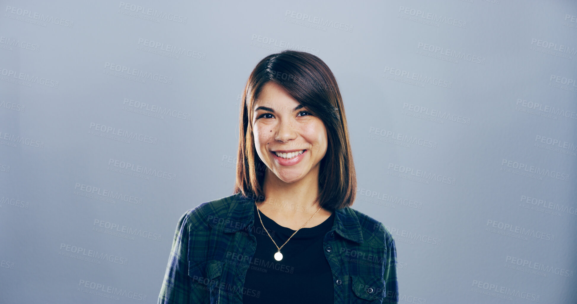 Buy stock photo Portrait, smile and creative business woman, writer and magazine editor isolated on gray studio background. Face, space and confident person, professional and worker with opportunity in Portugal