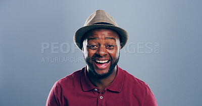 Buy stock photo Portrait, black man and laughing in studio for funny joke, comedy and happy with space. Face, smile and African person with humor, excited and LOL with comic emotion on gray background with hat