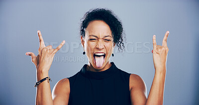 Buy stock photo Crazy, studio and woman with rock hand gesture or tongue out for expression or heavy metal on gray background. Culture, edgy female rocker or person with devil horn sign, funky emoji or punk symbol