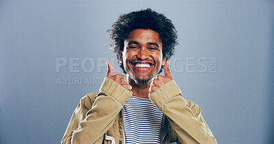 Buy stock photo Happy man, portrait and good job with thumbs up for success, winning or approval on a gray studio background. Face, male person or model with smile, emoji or yes sign for well done on mockup space