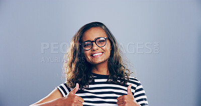 Buy stock photo Portrait, thumbs up or woman in studio, glasses or agreement on gray background. Face, person or model with hand gesture, space or icon with symbol, perfect eyesight or like with review for optometry
