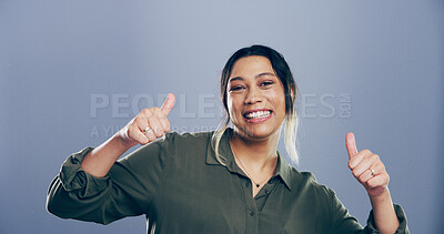 Buy stock photo Portrait, thumbs up and woman with winner, support and confidence on gray studio background. Face, happy person and model with hand gesture, agreement and icon with symbol, review and like with emoji