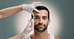 Hands, plastic surgery and syringe with portrait of man in studio for change or transformation. Collagen, face and injection of client with doctor on gray background for cosmetic surgery or facelift
