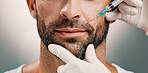 Hands, man and face injection in studio of skincare, facelift cosmetic and anti aging treatment. Person, needle and beauty procedure with dermal filler, facial implants and change on white background
