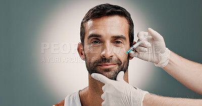 Buy stock photo Hands, injection and plastic surgery with portrait of man in studio for change or transformation. Collagen, face and syringe of doctor with patient on gray background for cosmetic filler or facelift