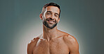 Portrait, skincare and happy man in studio for natural beauty, shirtless and facial treatment on gray background. Face, cosmetics and male model with confidence for dermatology, glow and aesthetic