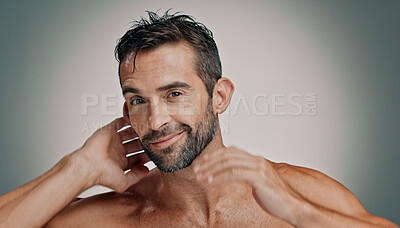 Buy stock photo Smile, hair and skincare with portrait of man in studio for cleaning, salon grooming and dermatology. Self care, cosmetics and aesthetic with person on background for facial and spa treatment
