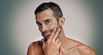Beauty, beard and grooming with portrait of man in studio for cleaning, salon skincare and dermatology. Self care, cosmetics and aesthetic with person on background for facial and spa treatment