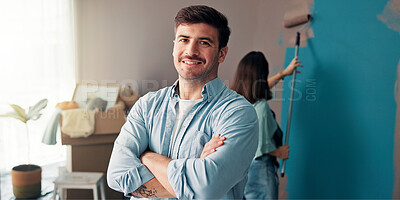 Buy stock photo Portrait, confidence and man in new home for painting, wall decor or renovation. DIY, interior design and smile with couple for improvement, remodeling and space for real estate with arms crossed