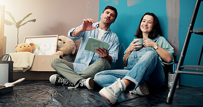 Buy stock photo Home, renovation and couple with tablet, baby room and conversation with planning for decoration. Apartment, parents or man with woman on floor, tech and ecommerce choices with diy, break or internet