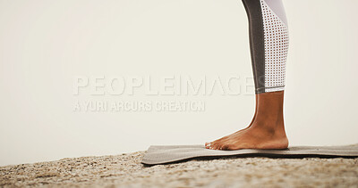Buy stock photo Feet, yoga mat and outdoor on rocks, nature and mock up space for exercise, pilates or wellness in morning. Person, legs and stone for workout, health and training with start for warm up in summer
