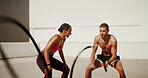 Woman, man and personal trainer with fitness ropes for muscle growth, motivation and outdoor for exercise. People, coach or mentor with support, workout and resilience for bodybuilding challenge