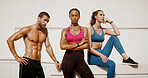 Fitness, people or confident in city with break, exercise rest or sweat with wellness. Man, woman portrait or athlete group at building for teamwork, healthy body or development with personal trainer