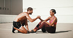 Fitness, support and people in city with help after training, exercise and workout outdoors. Sports, personal trainer and man and woman for wellness, performance and health for endurance challenge