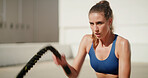 Workout, woman and battle ropes outdoor for core strength, power training and muscular endurance. Athlete, person and energy with exercise equipment for fitness, health performance or sport challenge