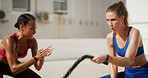 Fitness, personal trainer or woman with battle ropes to workout, exercise or health. Muscle, outdoor or bodybuilder with coach for strength, power or clap for motivation with cardio challenge in city