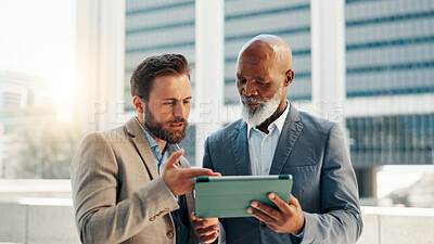 Buy stock photo Business people, tablet and men in city, stress and conversation with mistake. Concern, financial consultant or tax advisor in street, bad review or tech with website info or bankruptcy in New York