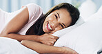 Portrait, resting and woman in bedroom, smile and happiness with weekend break, calm and morning. Person, home and girl with joy, comfortable and awake with health, wellness and afternoon nap