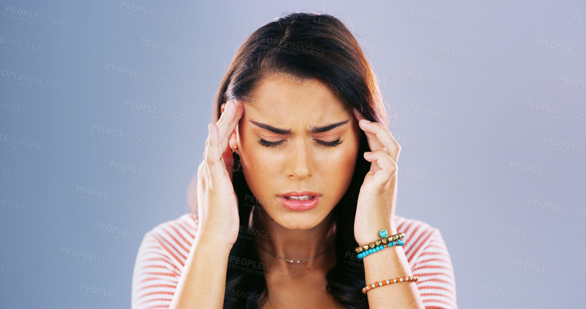 Buy stock photo Girl, headache and pain in studio, stress and burnout with temple massage for relief by background. Woman, person and frustrated for chronic migraine with brain fog, pressure or dizzy with fatigue