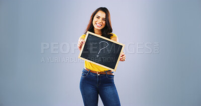 Buy stock photo Woman, portrait and studio background with black board for question, opinion and smile on gray mockup space. Female person, sign and billboard poster for information, vote notification or promotion