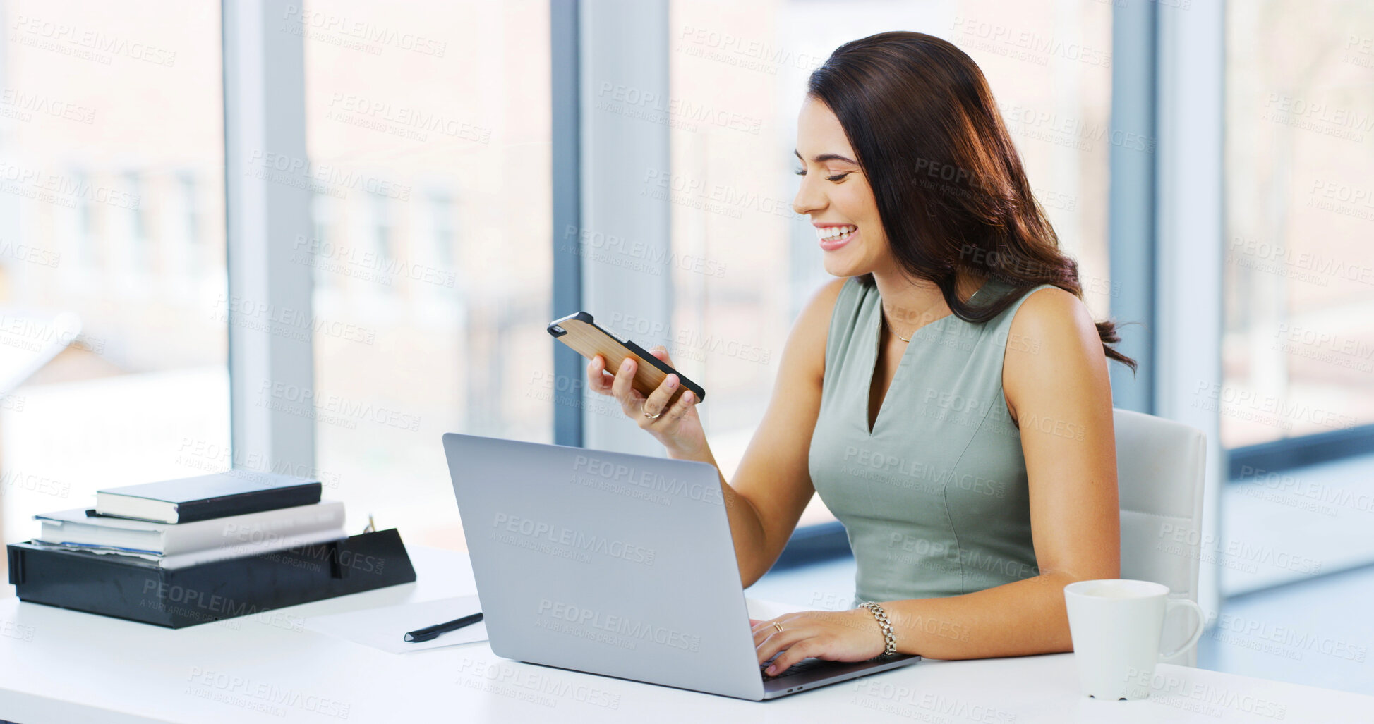 Buy stock photo Phone, laptop and smile with business woman in office for lawyer, litigation and policy approval news. Legal advisor, client patent and copyright manager with person for trademark review and reading