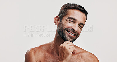 Buy stock photo Portrait, beauty and man for skincare in studio of facial glow,  natural cosmetic and treatment results. Male person, smile and hair growth of grooming routine, dermatology shine and white background