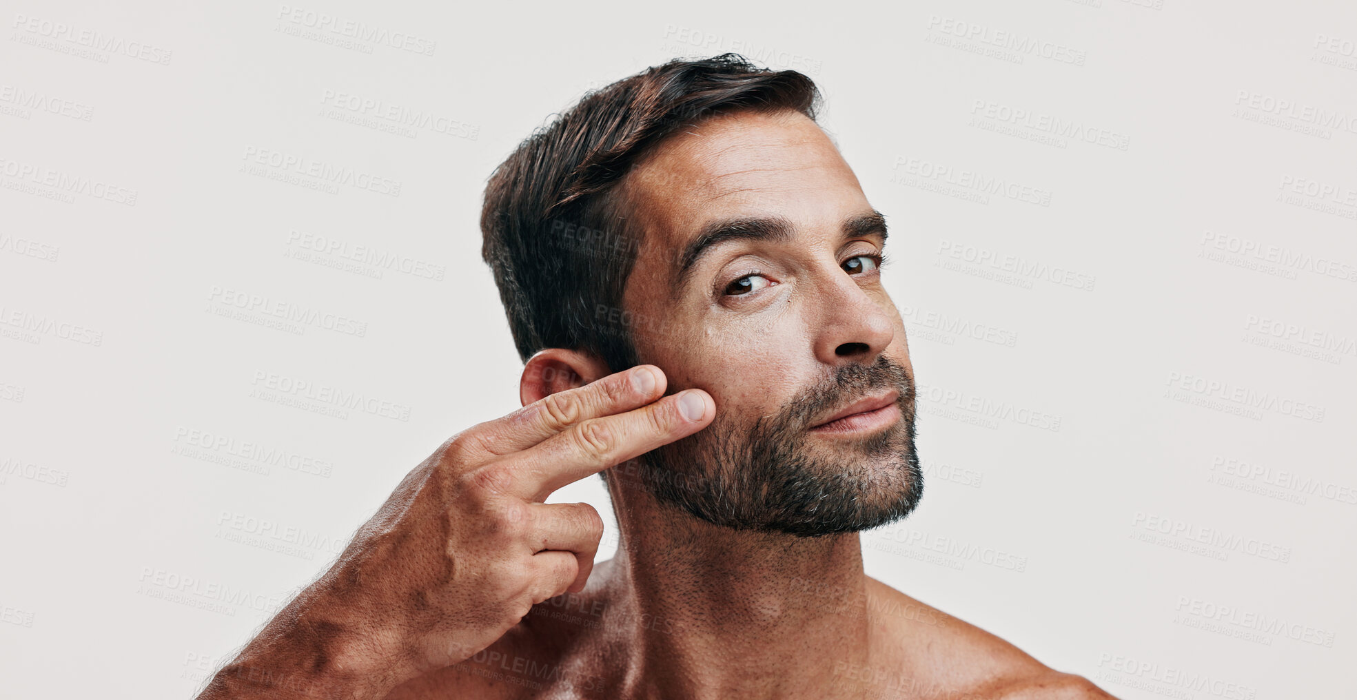 Buy stock photo Beauty, dermatology and portrait of man in studio for antiaging treatment or skincare. Aesthetic, cosmetics and wellness with confident model isolated on white background space for self care routine