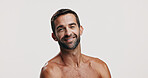 Confident, skincare space or portrait of man in studio for beauty glow, grooming face and dermatology. Self care cosmetics, male model and person on white background for facial treatment or mockup