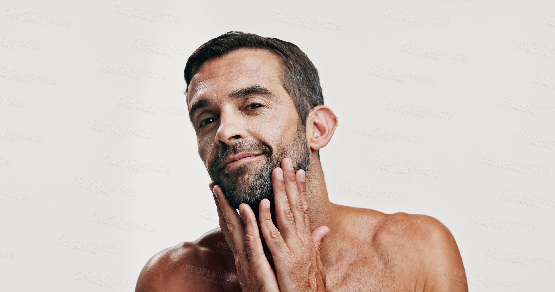 Buy stock photo Portrait, man and check for skincare in studio with facial hair, natural cosmetics and progress results. Male person, pride and beard growth with maintenance routine, dermatology and white background