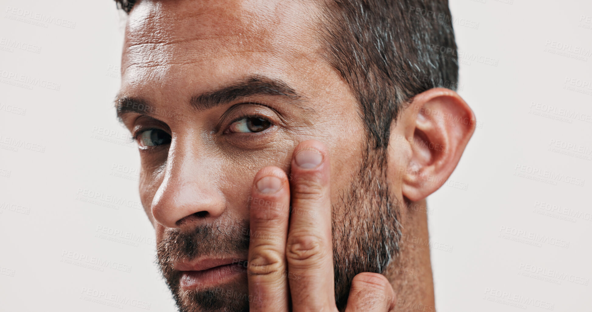 Buy stock photo Portrait, man and lotion for skincare in studio of facial glow, natural cosmetic and treatment results. Person, beauty or collagen cream of grooming hydration, dermatology care and white background