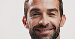 Portrait, smile and man for skincare in studio of facial glow,  natural cosmetic and treatment results. Male person, beauty and hair growth of grooming routine, dermatology shine and white background
