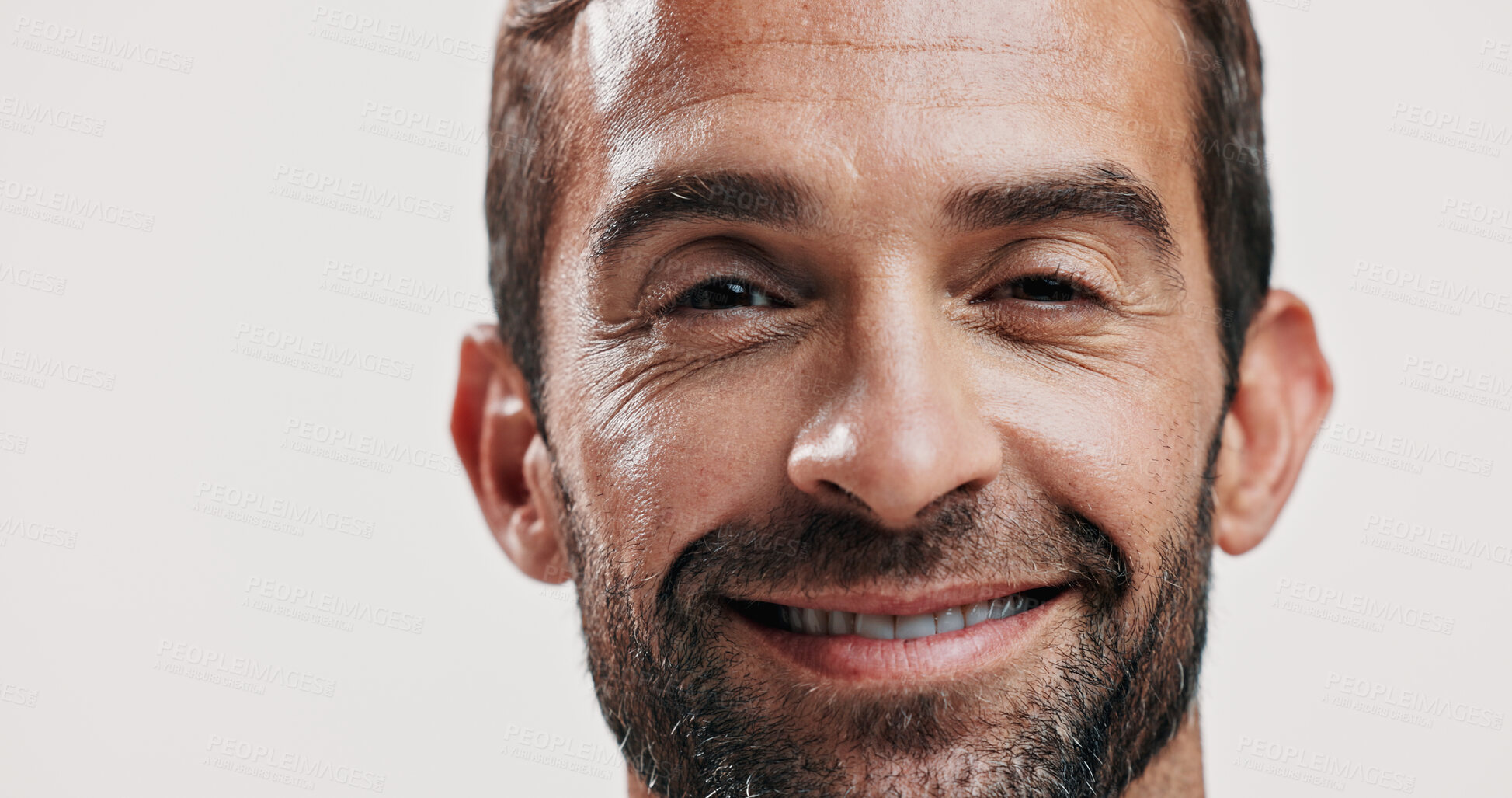 Buy stock photo Portrait, smile and man for skincare in studio of facial glow,  natural cosmetic and treatment results. Person, face beauty and hair growth of grooming routine, dermatology shine and white background