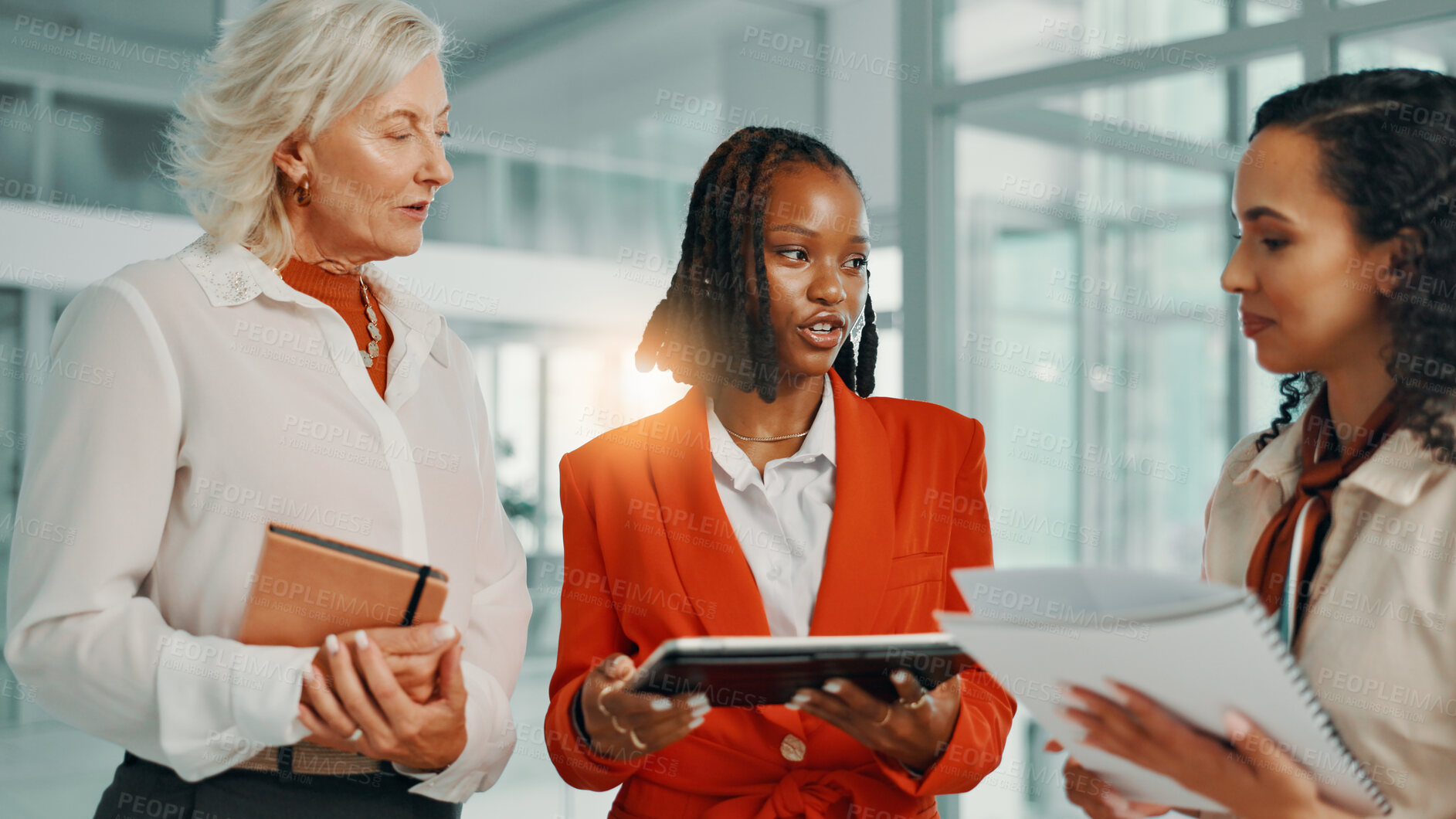 Buy stock photo Documents, meeting and tablet with business women in lobby of office for planning or strategy. Collaboration, discussion or proposal with boss and employee team in workplace for feedback or review
