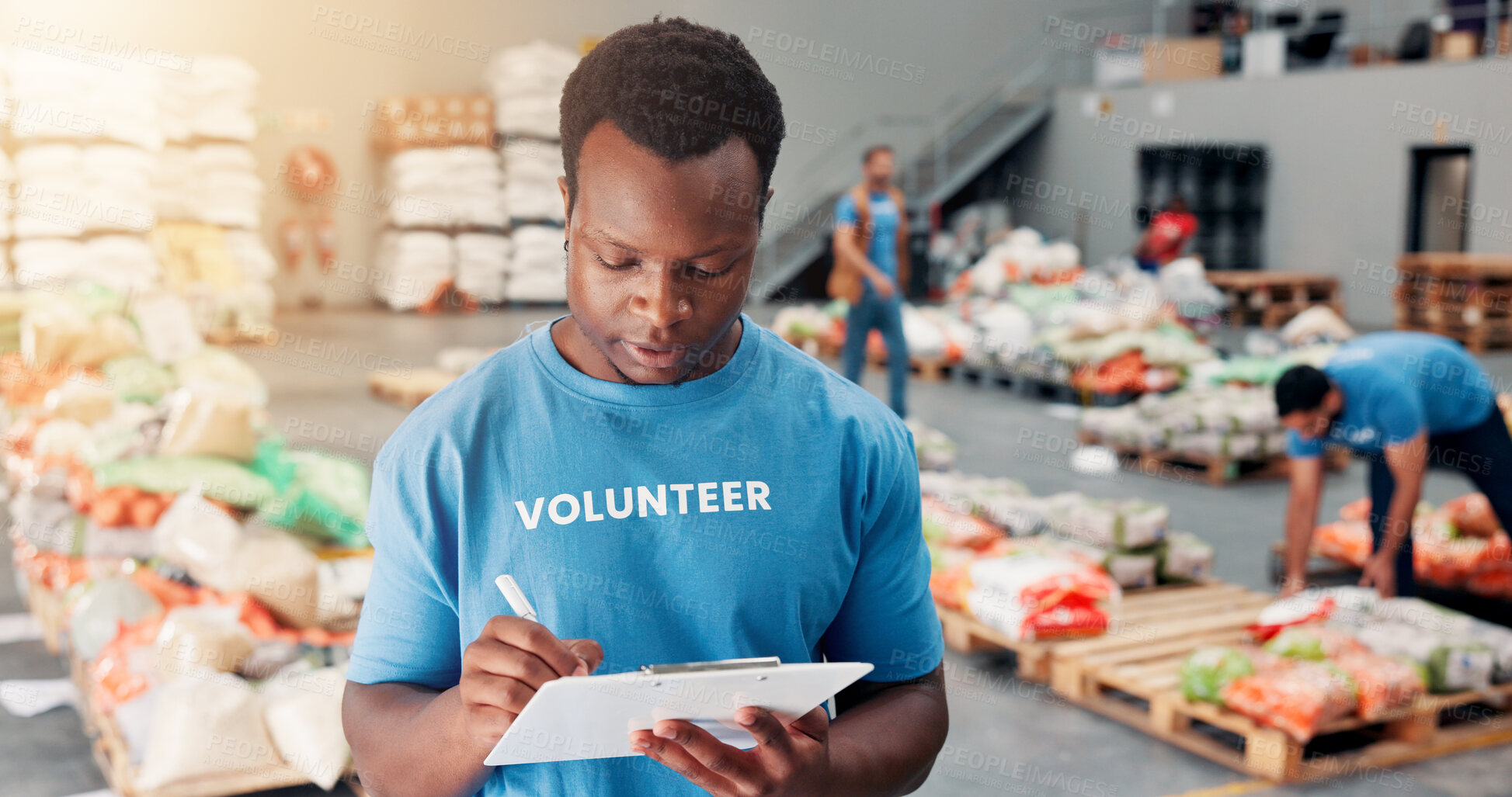 Buy stock photo Volunteer, donation and checklist with man in warehouse for non profit, inventory clipboard and distribution. Charity, social responsibility and food bank program with person in factory for ngo plan
