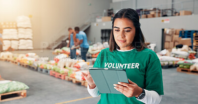 Buy stock photo Volunteer, donation and reading with woman in tablet for non profit, inventory checklist and humanity project. Charity, social responsibility and food bank program with person in factory for ngo plan