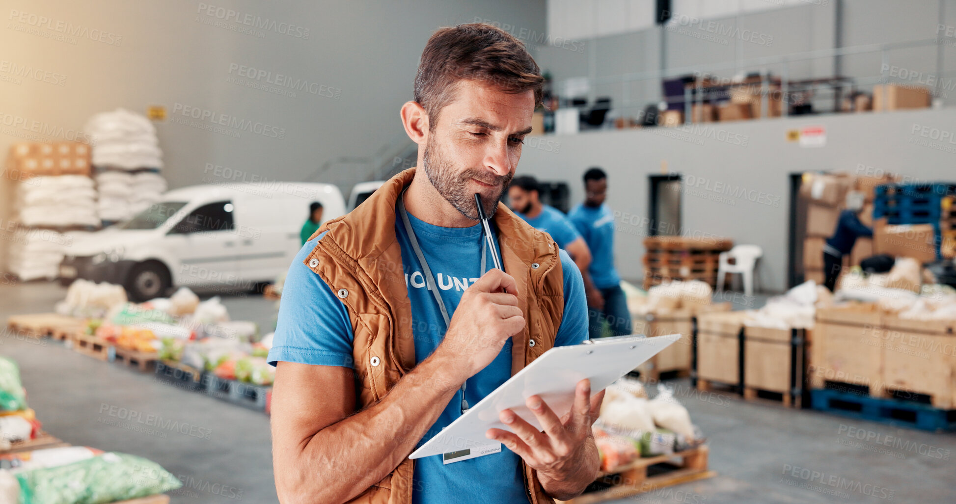 Buy stock photo Volunteer, thinking and clipboard with man in warehouse for non profit, inventory vision and reflection. Charity, social responsibility and food bank program with person for ngo plan for donation