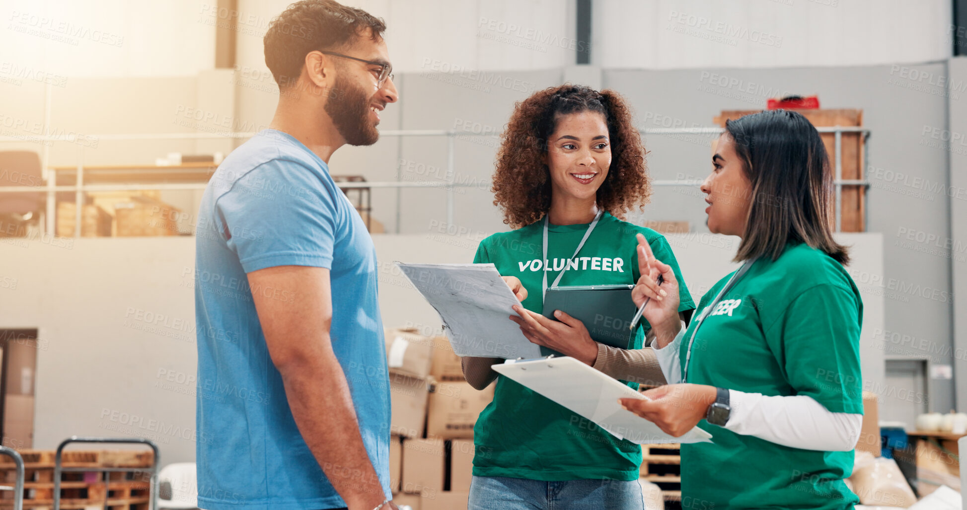Buy stock photo Warehouse, volunteers and people with clipboard, smile and review of donations on document or discussion. Social responsibility, tablet and group in factory with food for community service or charity