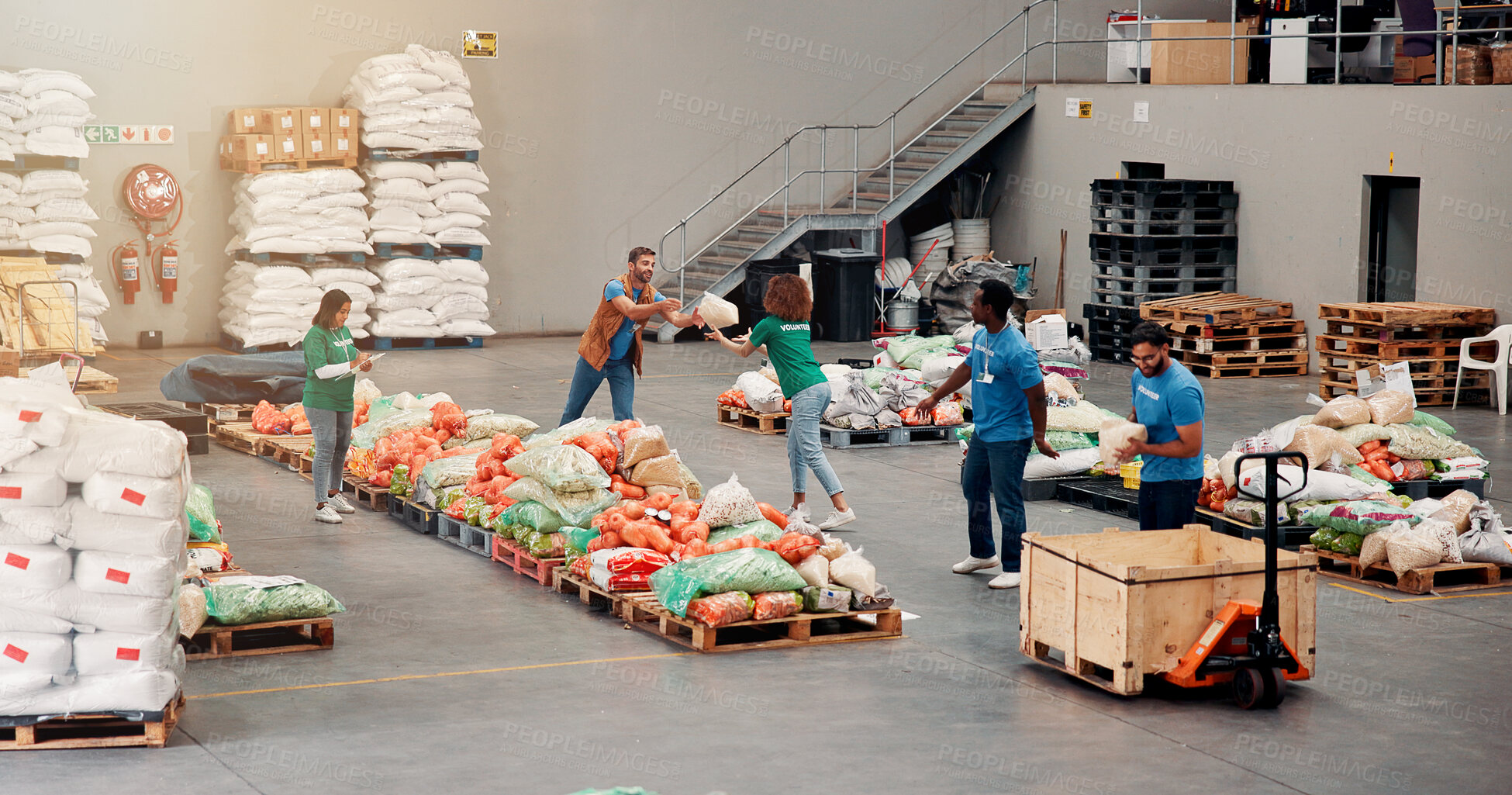 Buy stock photo People, volunteer and help with food distribution for grocery donation, sorting vegetables and charity aid. Staff, packaging stock and community outreach, social responsibility and non profit program