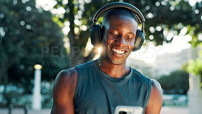 Buy stock photo Nature, black man and fitness with smartphone for music, podcast and confidence with audio track. Outdoor, male person and runner with headphones to listen, radio and mobile with hip hop for exercise