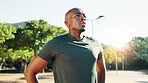 Outdoor, black man and fitness with thinking for rest, cardio challenge and exhausted after running. Nature, male person and runner with thoughts on break, tired and wellness with health for exercise