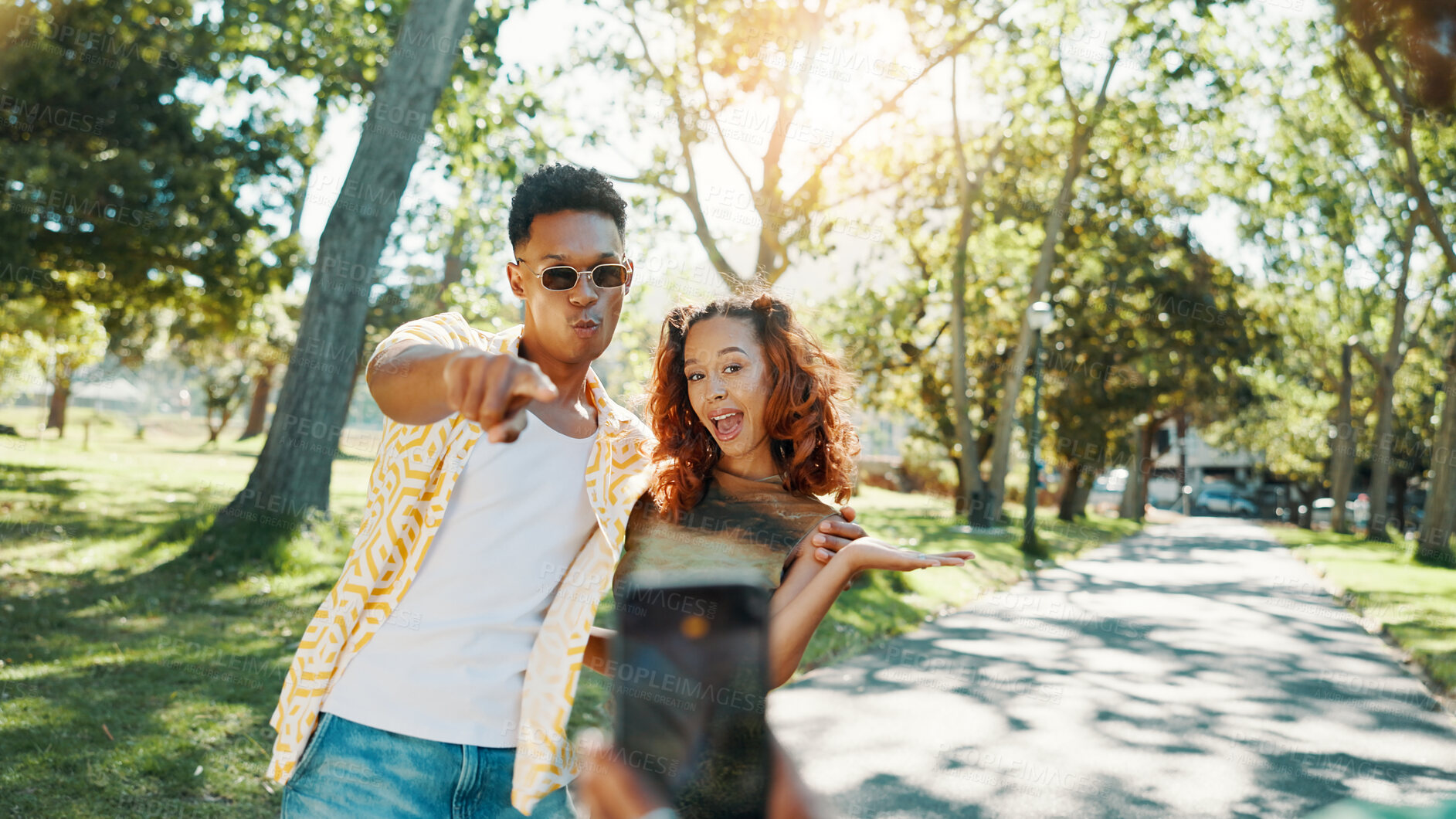 Buy stock photo Happy, photography and couple in nature on date for memory, connection or social media post. Excited, outdoor and man with woman for profile picture in park on spring break together in garden.