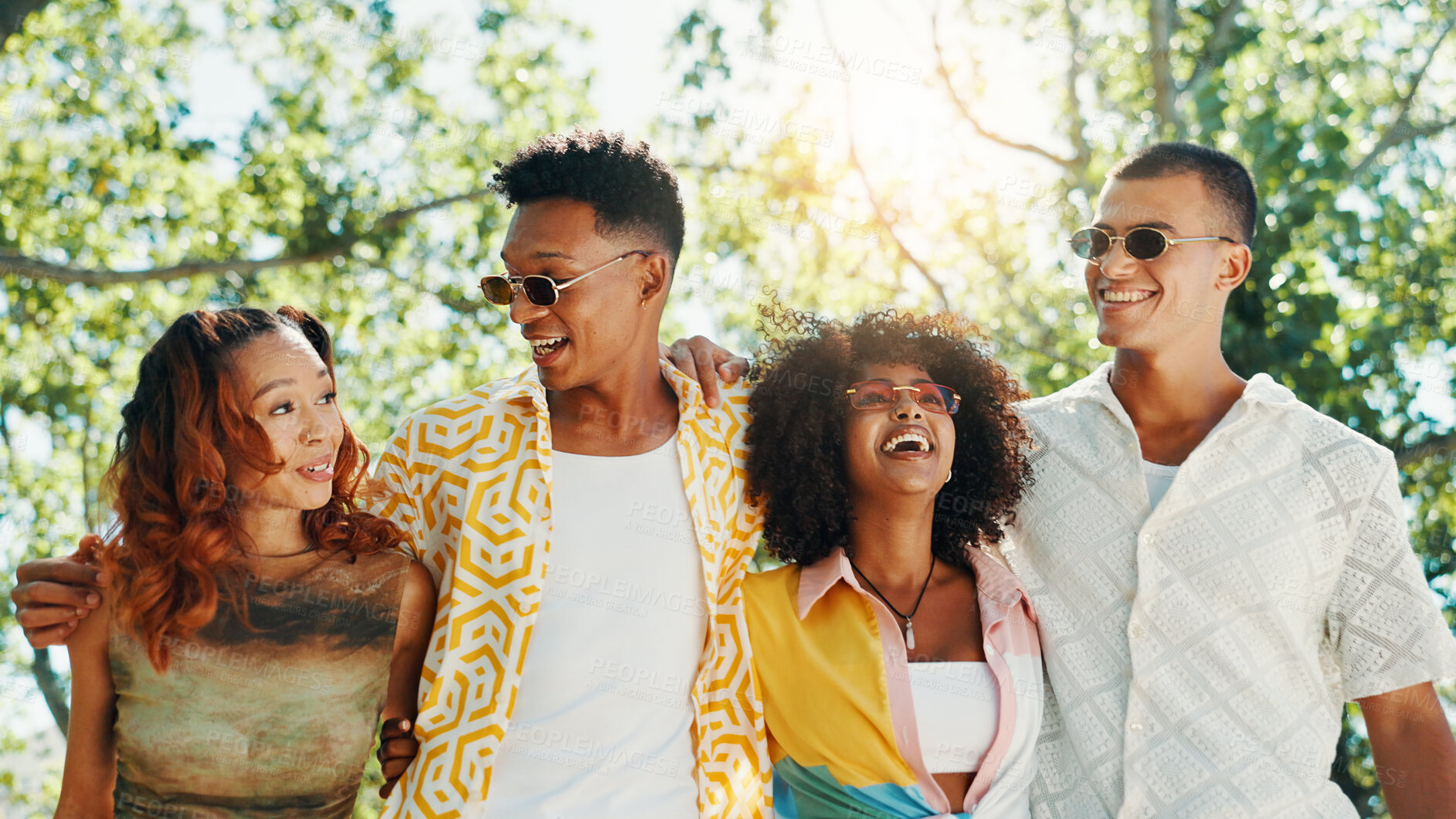 Buy stock photo Smile, group and people walk at park with social gathering, university break and bonding together. Couple of friends, laughing and embrace on summer vacation, travel and reunion with streetwear style