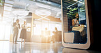 Lobby, meeting and business people with cubicle in office for coworking space for collaboration, teamwork and project. Professional, corporate and men and women in workspace pods for productivity