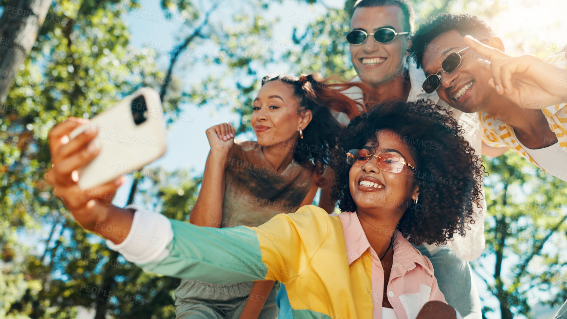 Buy stock photo Fashion, happy people and friends in nature for selfie together for cool style, bonding or reunion. Hangout, social media influencer or men with women in outdoor park for picture, vacation or holiday