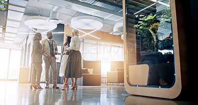 Buy stock photo Lobby, pod and business people in office talking for collaboration, teamwork or discussion. Professional, corporate and men meeting women with cubicle for private workspace for project or proposal