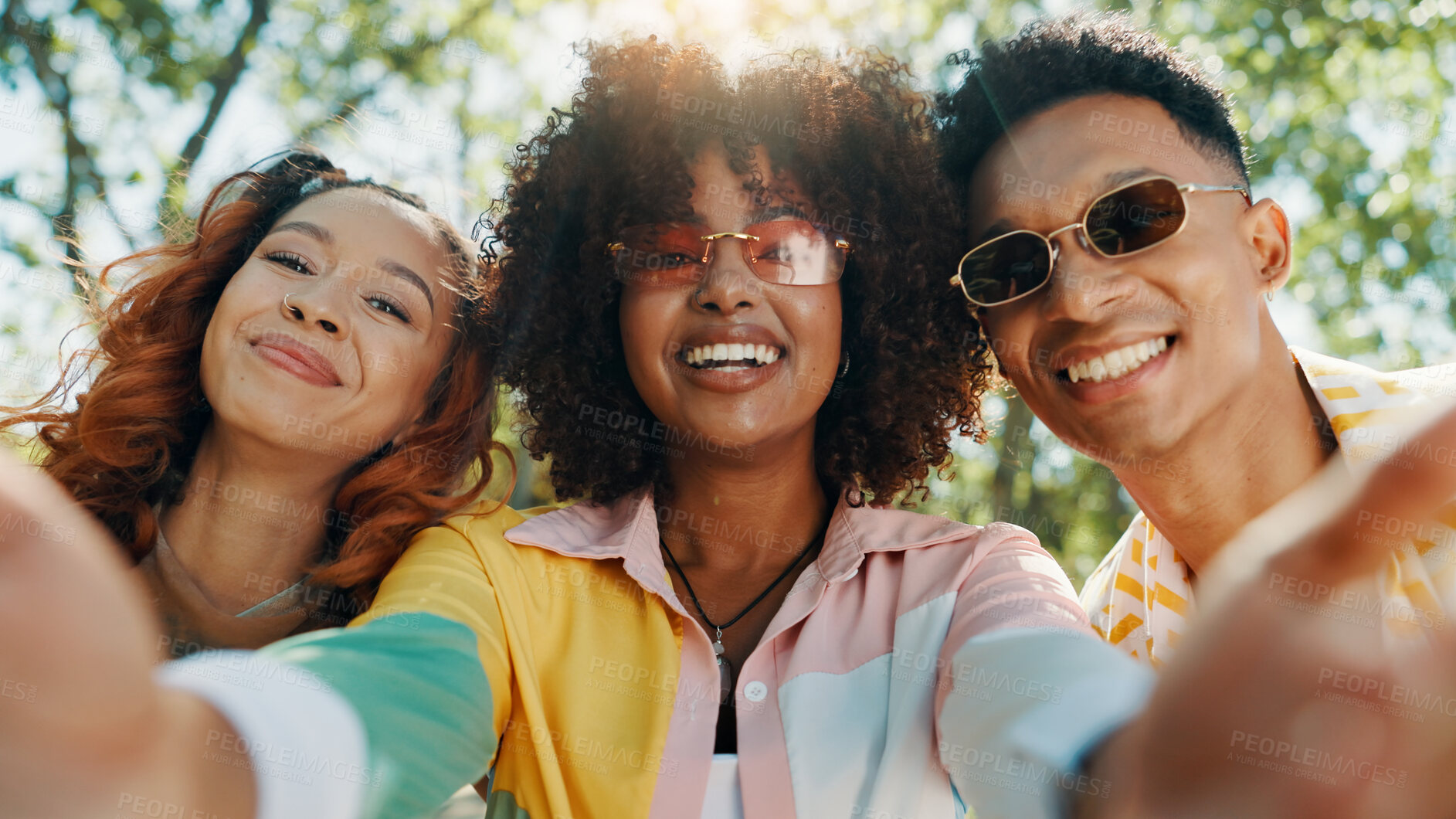 Buy stock photo Holiday, happy people and friends in park for selfie together for fashion, bonding or reunion. Gen z, social media influencer or men with women in outdoor nature for picture POV, vacation or hangout